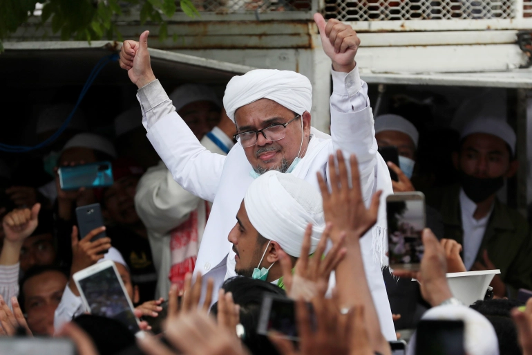 Indonesia jails Muslim leader for concealing COVID test result