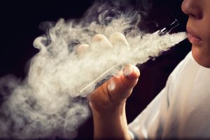Man with a e-cigarette